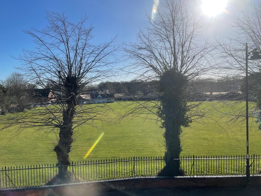 Lot: 135 - FIVE VACANT FLATS IN ONE FREEHOLD BUILDING - View of the Sudbury Cricket field from the window of Flat B